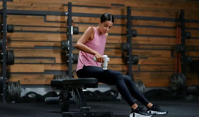 Hyperice Hypervolt Go 2 - Arctic Grey - Featuring Quiet Glide Technology - Handheld Percussion Massage Gun - 3 Speeds, 2 Interchangeable Heads - Helps Relieve Sore Muscles and Stiffness - FSA and HSA