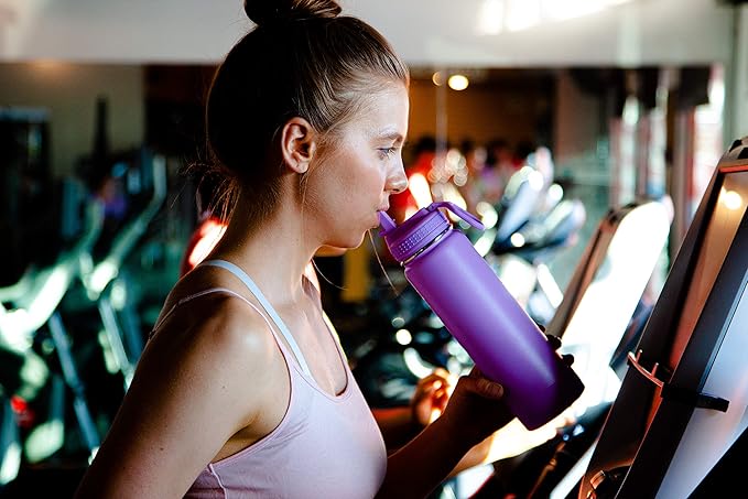 Takeya Actives 24 oz Water Bottle with Straw Lid - Double Wall Stainless Steel Insulation - Dishwasher Safe & BPA-Free - Removable Bumper - Lilac