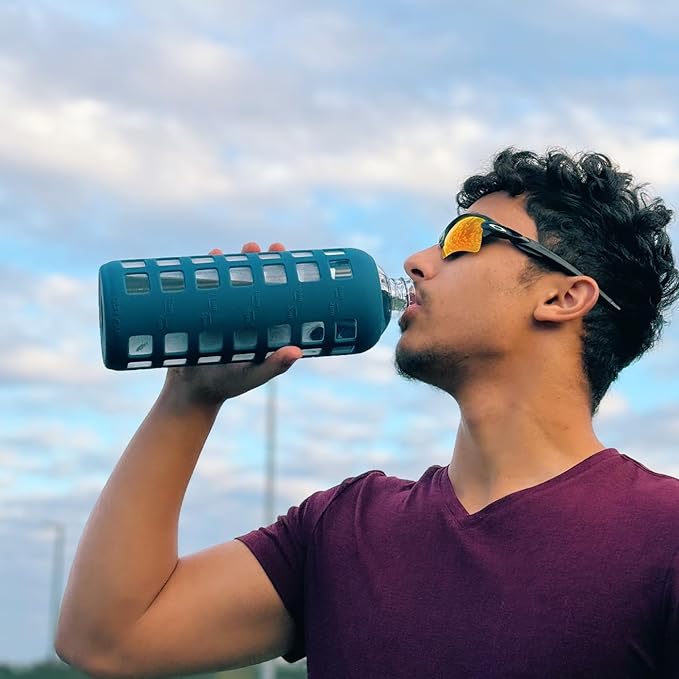 purifyou 40oz / 32oz / 22oz / 12oz Borosilicate Glass Water Bottle with Time & Volume Markers, Silicone Sleeve, Stainless Steel Lid | Reusable Glass Bottle for Water & Juice (40oz Chinese Porcelain)