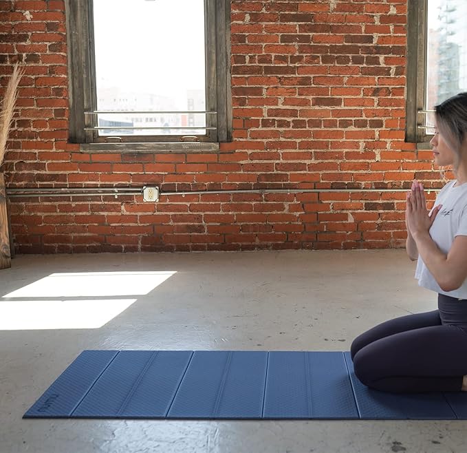 Numu Foldable Yoga Mat with Yoga Carrying Strap - Nonslip, Lightweight, and Portable 1/4” Inch Thick Workout Exercise Mat - Perfect for Easy Storage and Travel