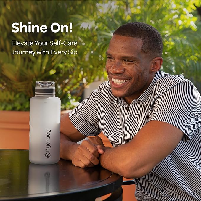 Hydracy Water Bottle with Time Marker -Large BPA Free Water Bottle & No Sweat Sleeve -Leak Proof Gym Bottle with Fruit Infuser Strainer & Times to Drink -Ideal for Fitness Sports & Outdoors